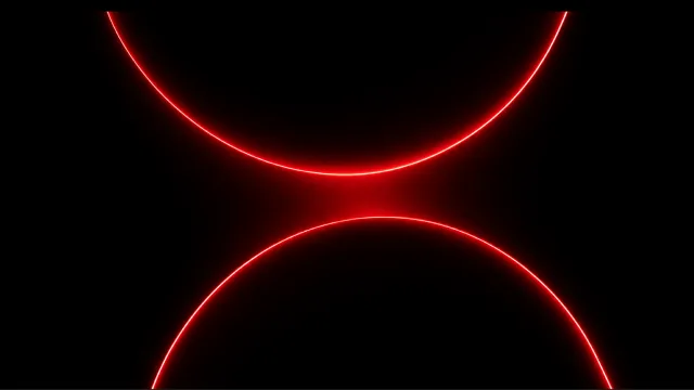 Two arcs of red light meeting in the middle of a black frame.