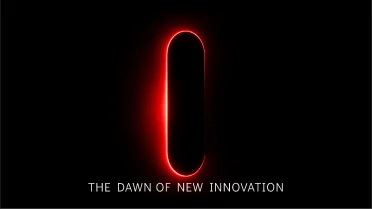 A capsule of red light in the dark.