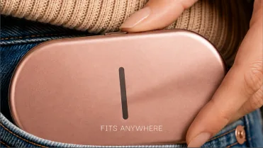 The device held at a jeans pocket.